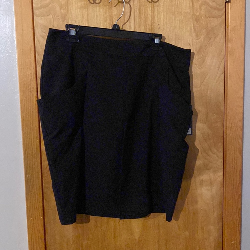 Jennifer Lopez black mini with pockets